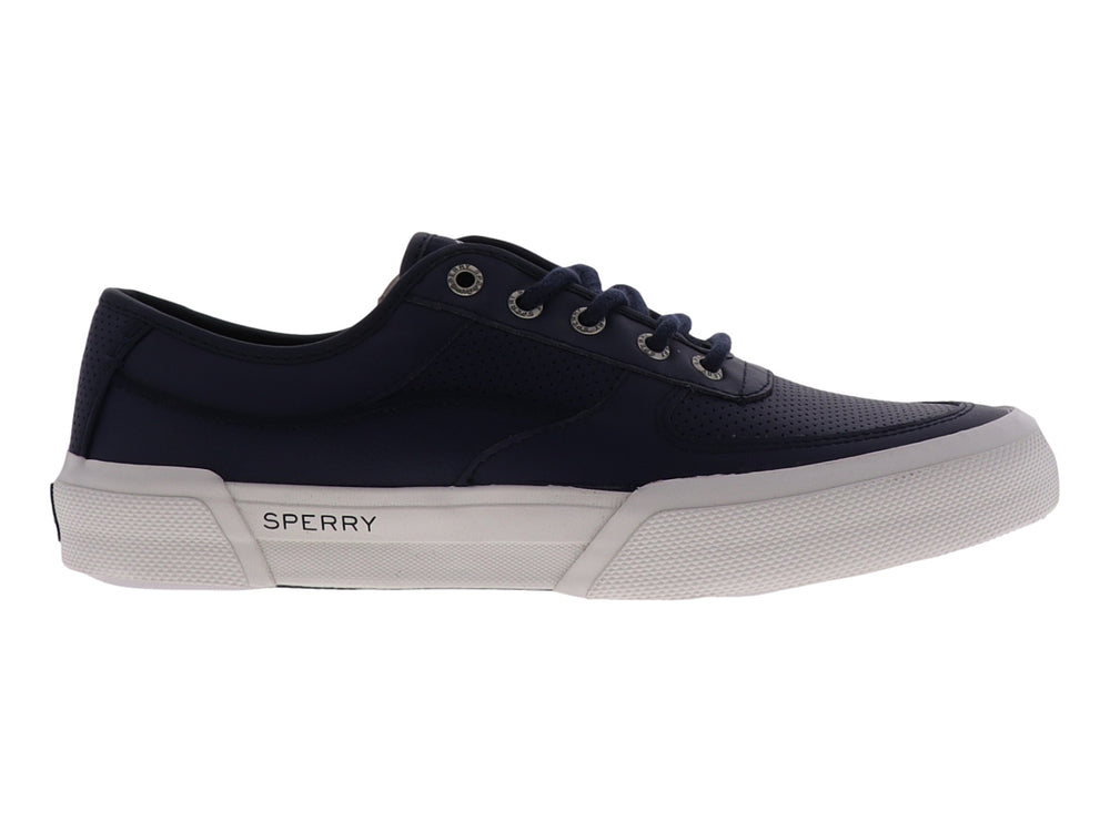 Zapatilla Sperry de color azul marino con suela blanca y cordones, estilo casual y deportivo.