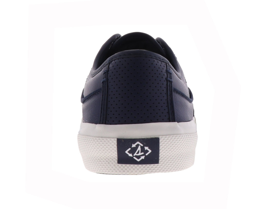 Zapatilla Sperry de color azul marino con suela blanca y cordones, estilo casual y deportivo.