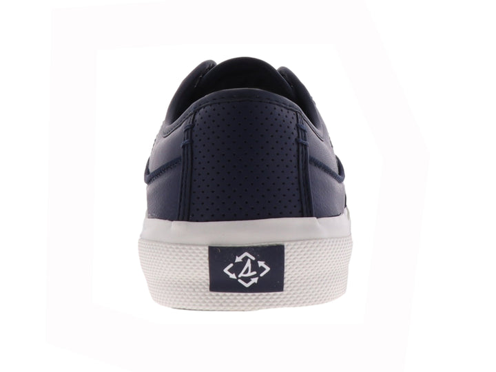Zapatilla Sperry de color azul marino con suela blanca y cordones, estilo casual y deportivo.