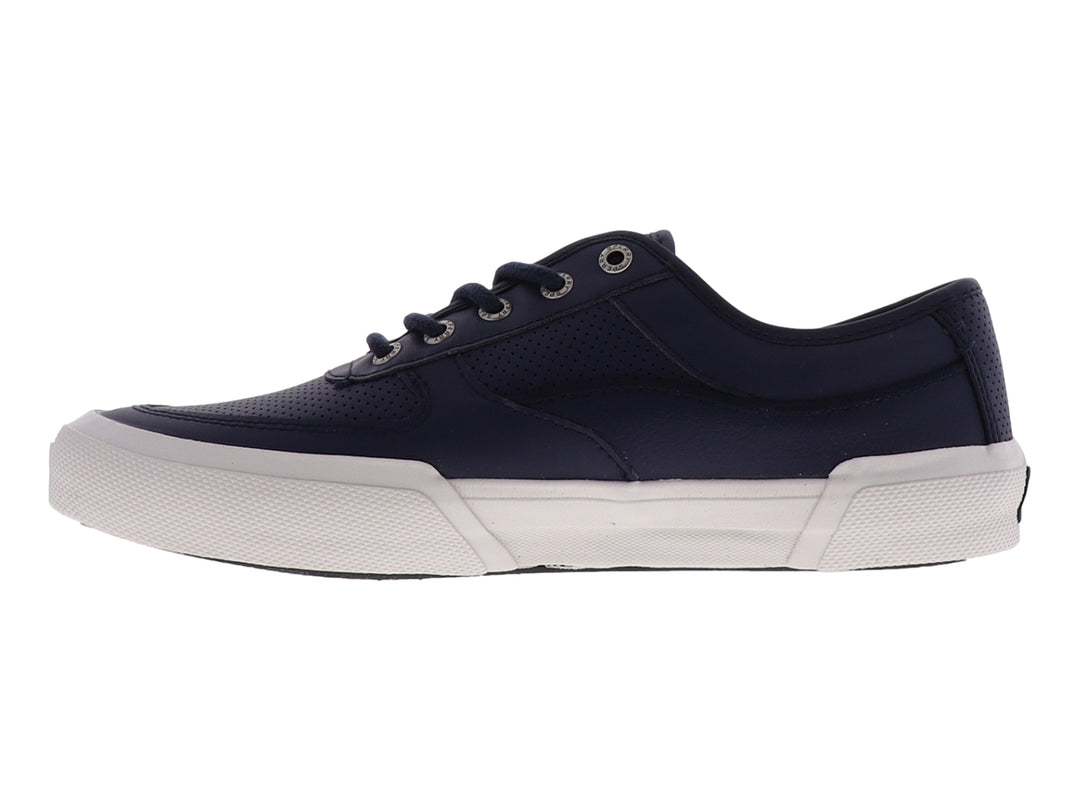 Zapatilla Sperry de color azul marino con suela blanca y cordones, estilo casual y deportivo.