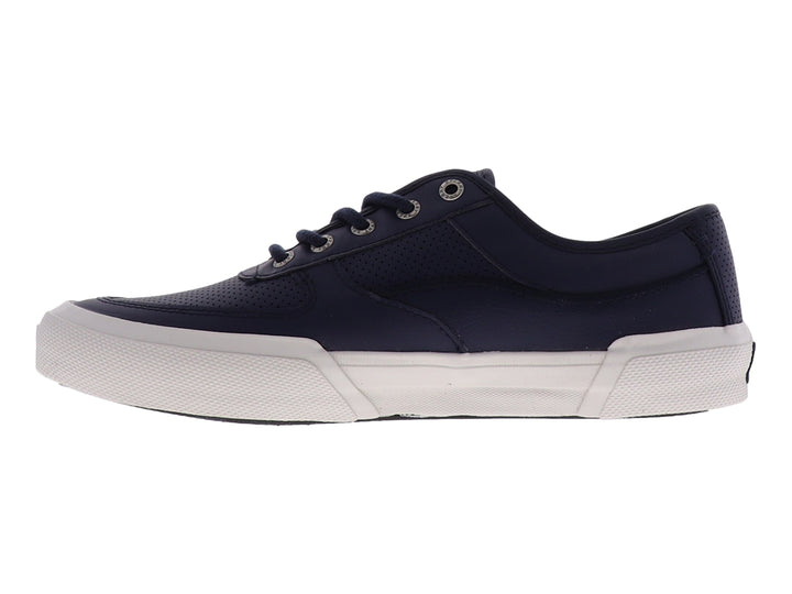 Zapatilla Sperry de color azul marino con suela blanca y cordones, estilo casual y deportivo.