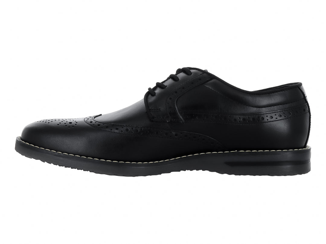 Zapato formal Oxford de cuero negro con detalles perforados tipo brogue y agujetas negras.