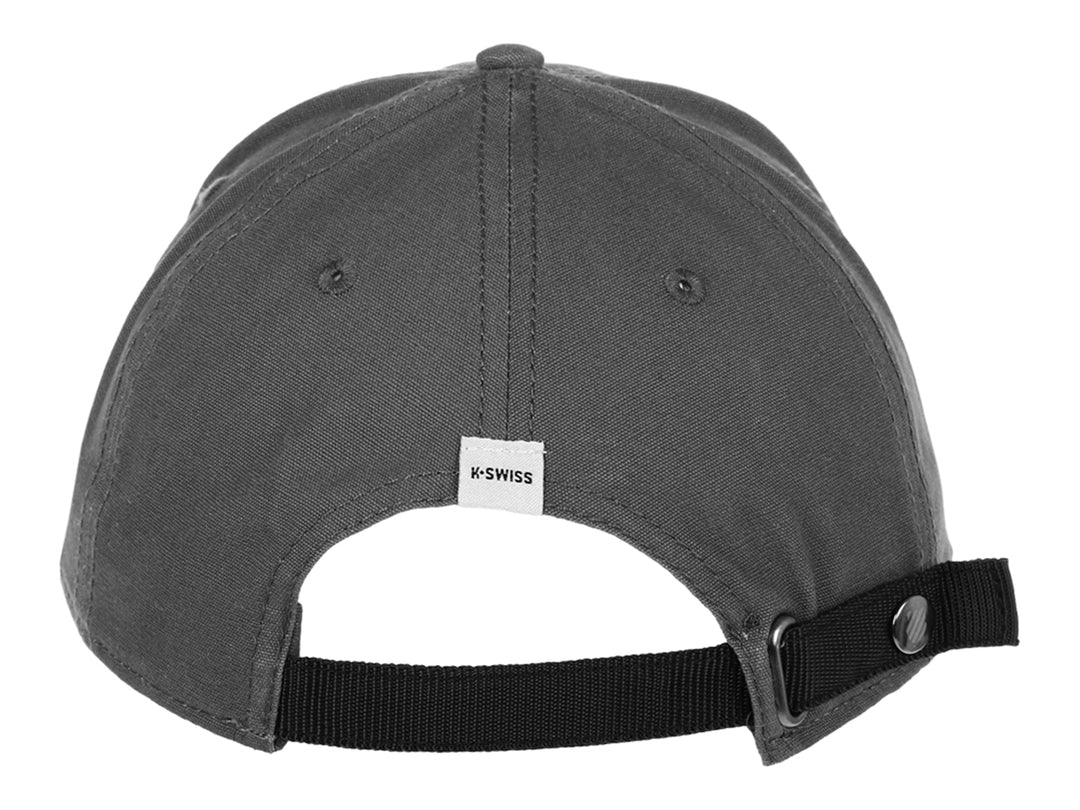 Gorra de béisbol K-Swiss en color gris con logotipo blanco frontal y etiqueta lateral.