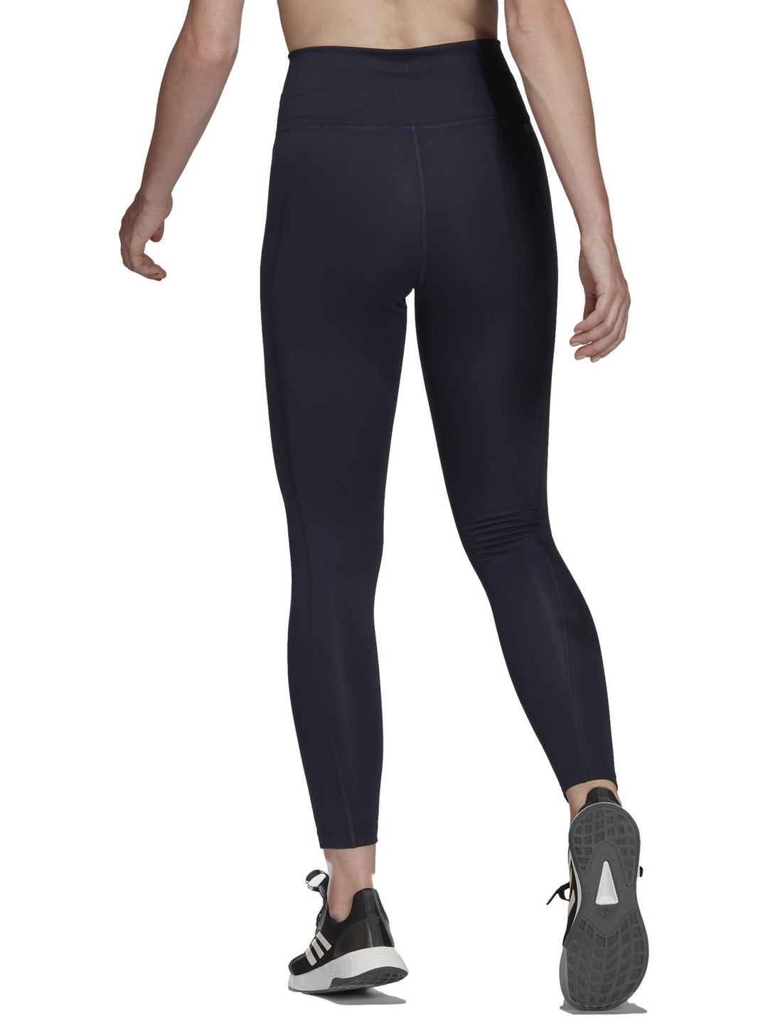 Leggings deportivos Adidas color azul marino ajustados al cuerpo.