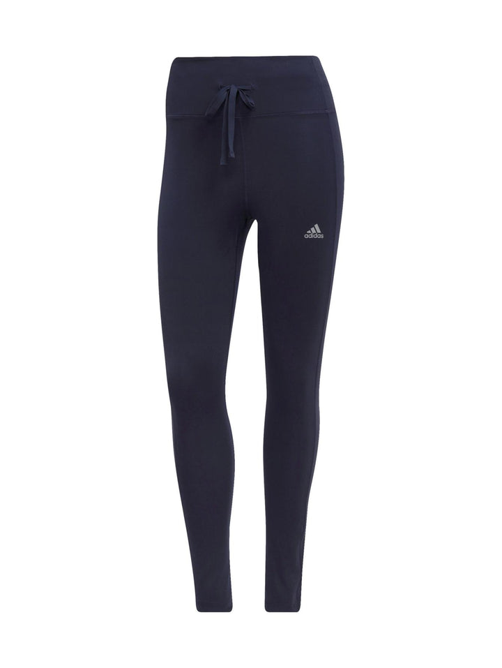 Leggings deportivos Adidas color azul marino ajustados al cuerpo.