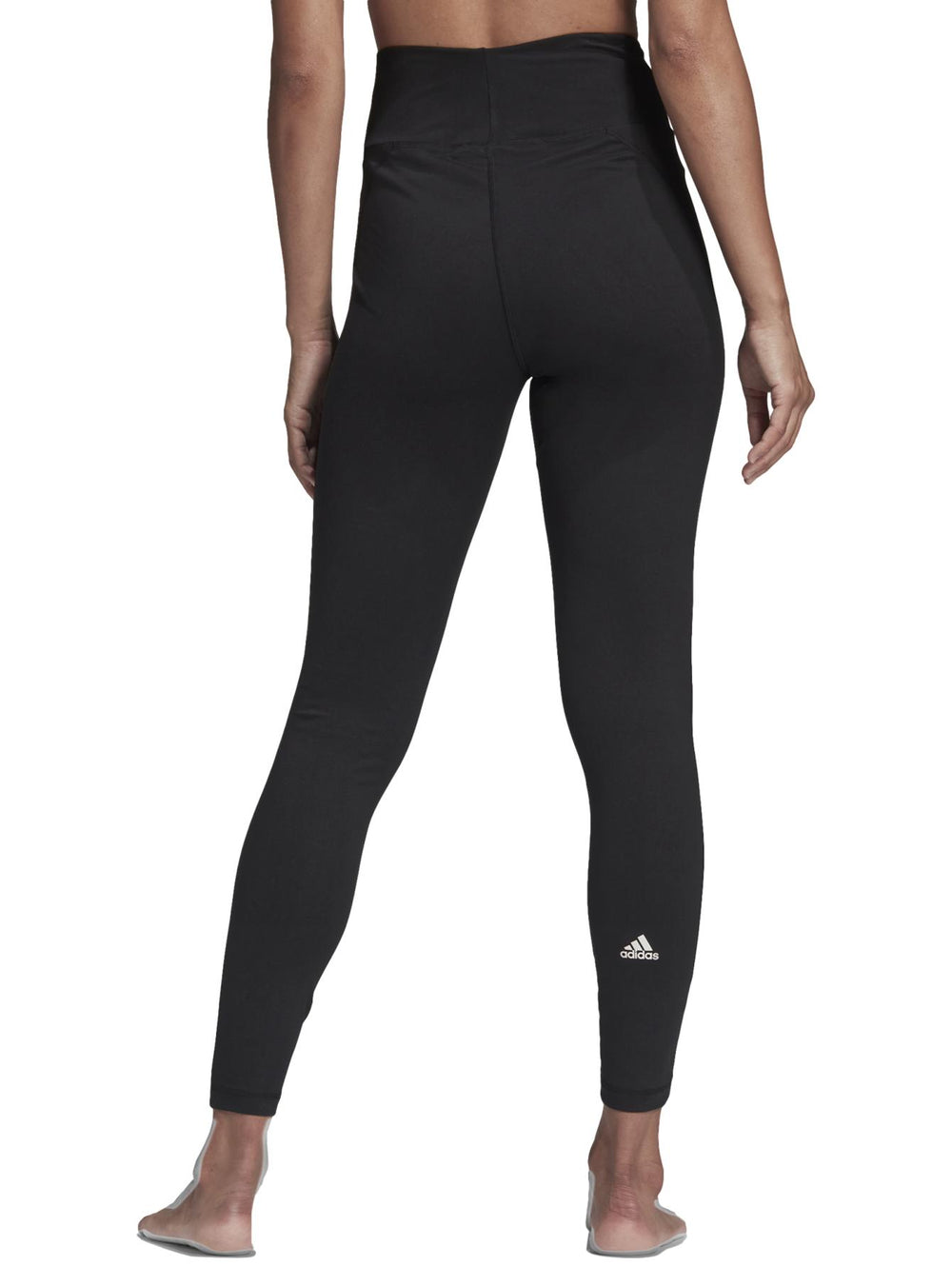 Leggings deportivos Adidas de color negro, cintura alta y ajuste ceñido al cuerpo.