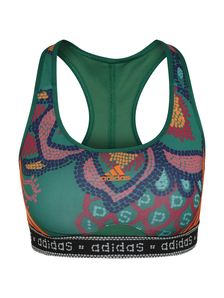 Conjunto deportivo Adidas de mujer en color verde con estampados multicolores y detalles en naranja.
