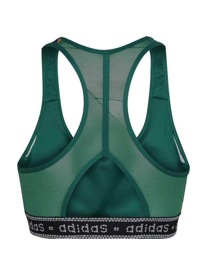 Conjunto deportivo Adidas de mujer en color verde con estampados multicolores y detalles en naranja.