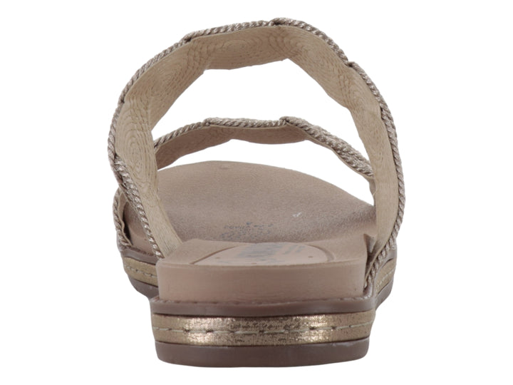 Sandalias color bronce para mujer con tiras de textil tejido y detalles circulares decorativos.