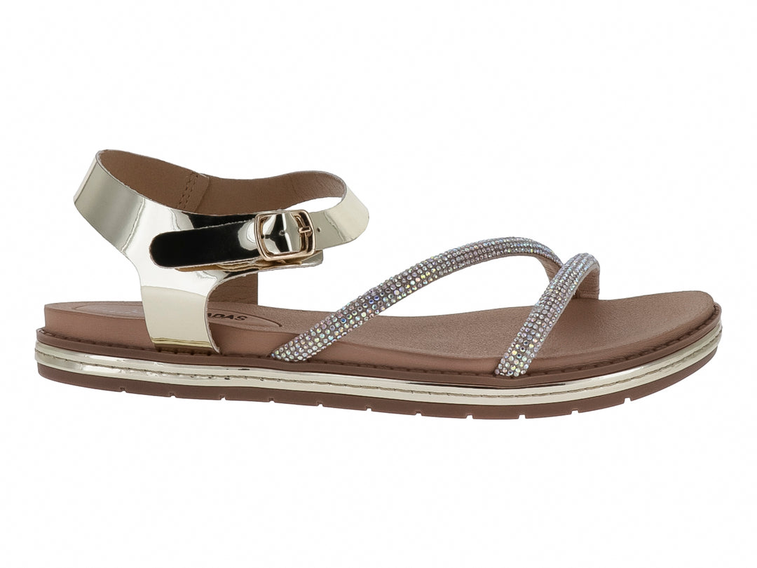 Sandalia plana color oro inglés con tiras decoradas con brillos y correa ajustable al tobillo para Mujer.