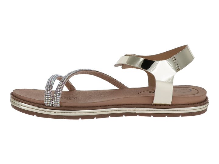 Sandalia plana color oro inglés con tiras decoradas con brillos y correa ajustable al tobillo para Mujer.