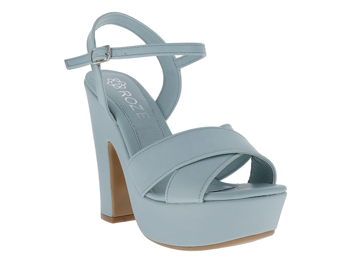 Sandalia de plataforma color azul tiffany con tacón alto y correa ajustable al tobillo.