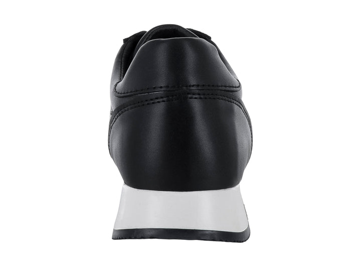 Zapato casual LUGO CONTI color negro con suela blanca y agujetas negras.