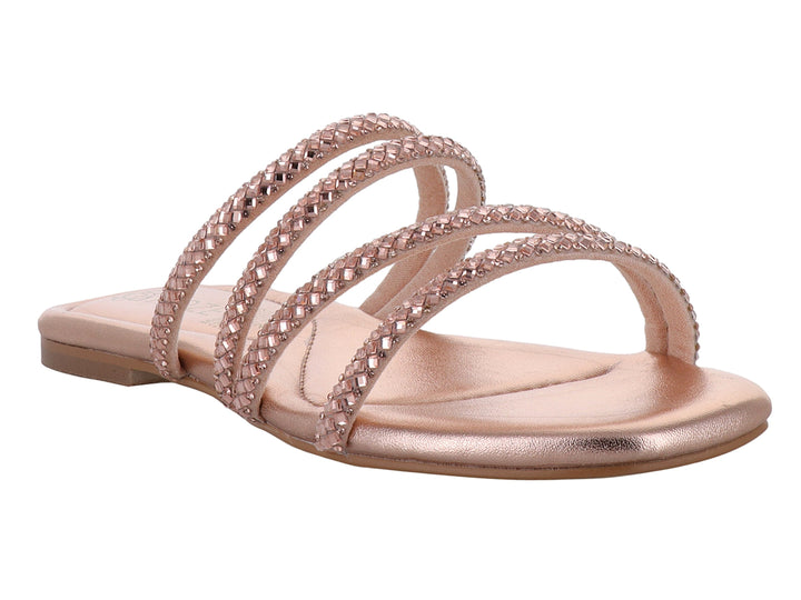Sandalia plana color oro rosado con tiras decoradas con brillos.
