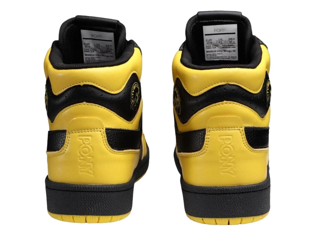 Tenis PONY de corte alto en colores amarillo y negro con suela negra.
