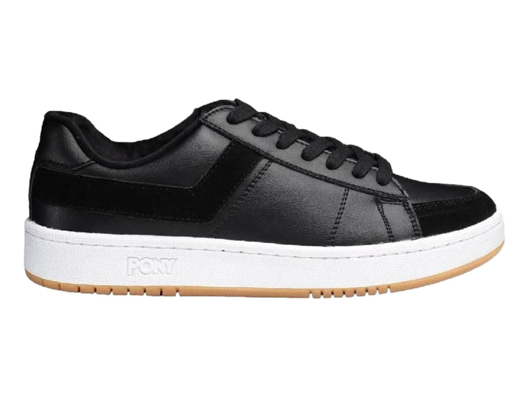Tenis PONY Pro 80 color negro con suela blanca y base de goma marrón.