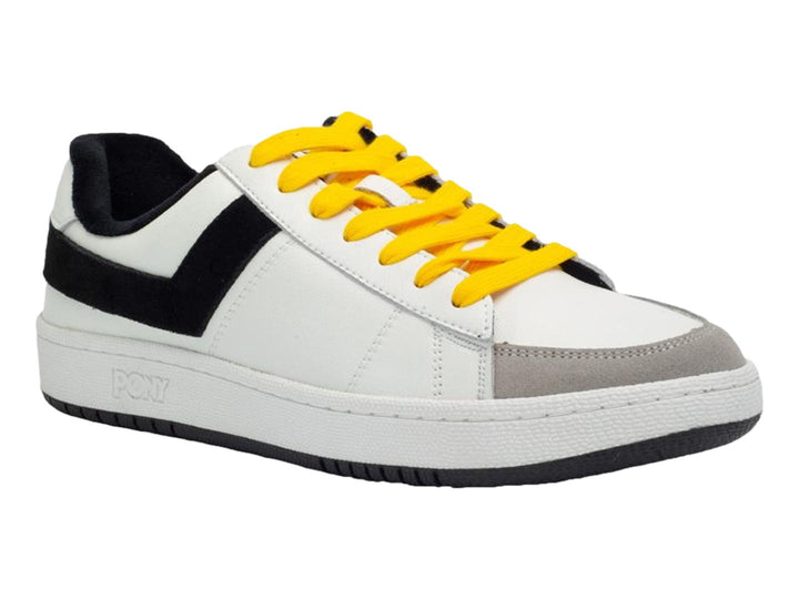 Tenis PONY blancos con franja negra lateral, agujetas amarillas y punta gris.