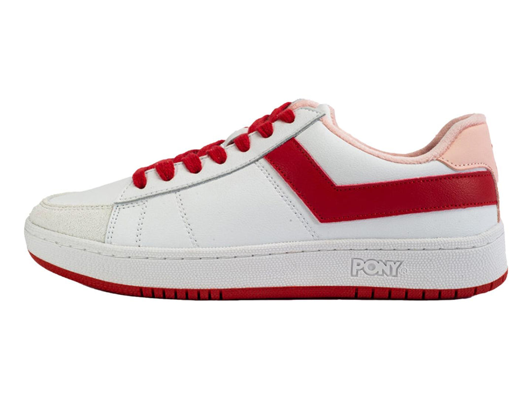 Tenis PONY PRO 80 color blanco con detalles en rojo y rosa, cordones rojos y suela blanca.