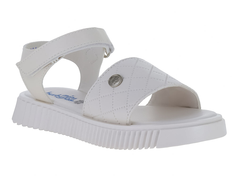 Sandalia blanca para niña con plataforma dentada, correa de ajuste y detalle acolchado en la parte frontal.