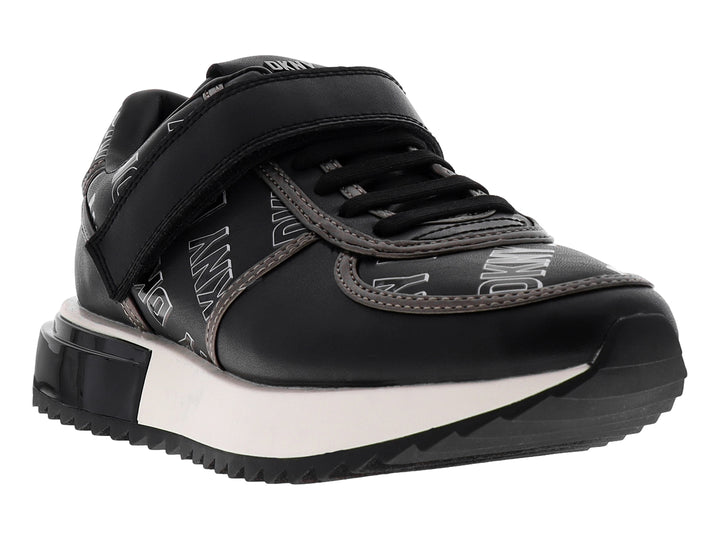 Tenis deportivos DKNY color negro y blanco con correa ajustable y suela blanca.