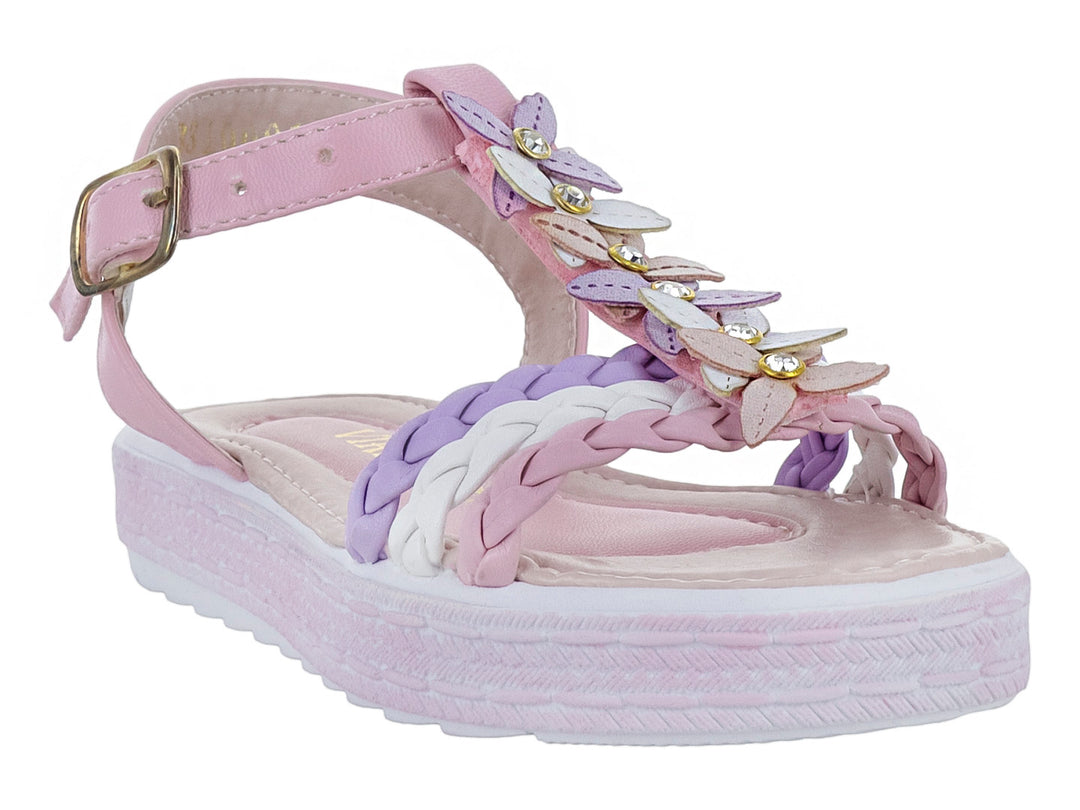Sandalias rosas para niña con plataforma, tiras trenzadas en blanco y morado y adornos de flores.