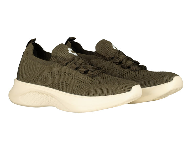 Par de tenis deportivos Charly en color verde oliva con suela blanca gruesa y tejido transpirable.