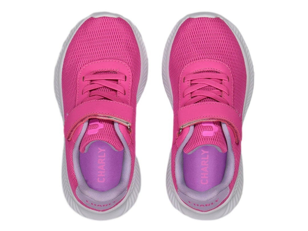Par de tenis deportivos Charly color rosa con suela blanca y cierre de velcro para niña.