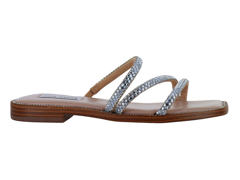 Sandalias planas de Steve Madden con tiras de brillantes plateados y plantilla beige.