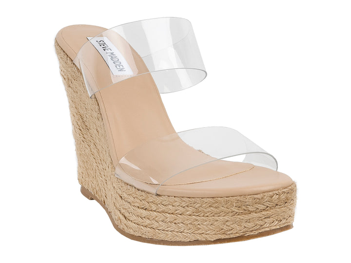 Sandalia Steve Madden Sedate Clear con tiras transparentes y plataforma de cuña en color beige.