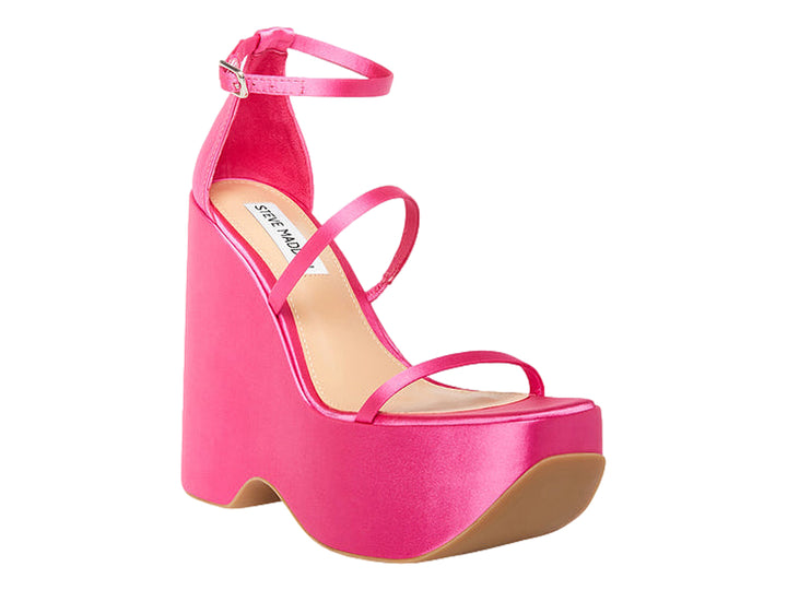 Sandalia de plataforma alta color fucsia brillante con correas finas y cierre al tobillo.