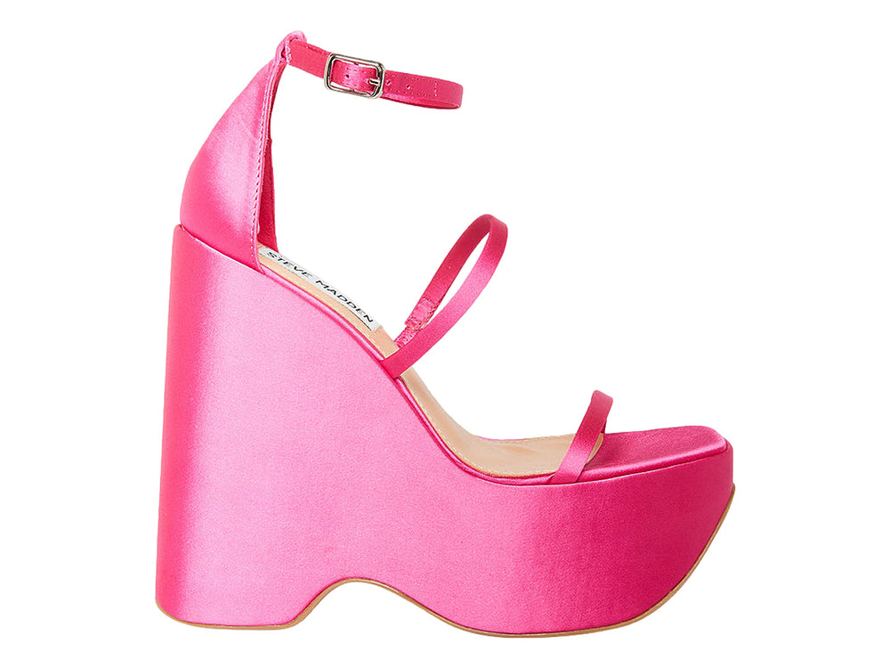 Sandalia de plataforma alta color fucsia brillante con correas finas y cierre al tobillo.