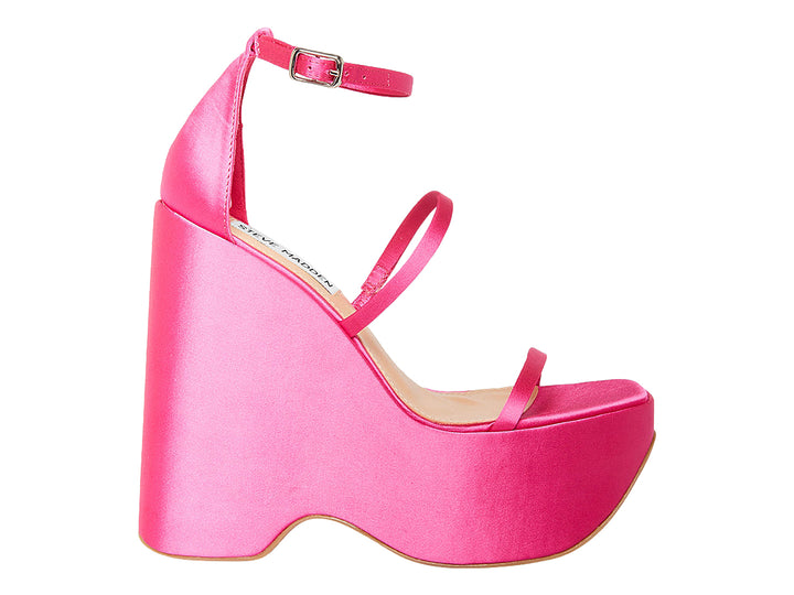 Sandalia de plataforma alta color fucsia brillante con correas finas y cierre al tobillo.
