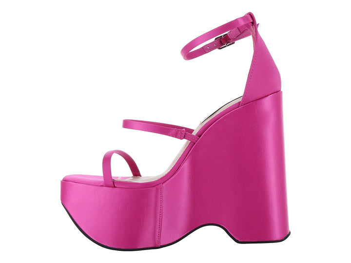 Sandalia de plataforma alta color fucsia brillante con correas finas y cierre al tobillo.