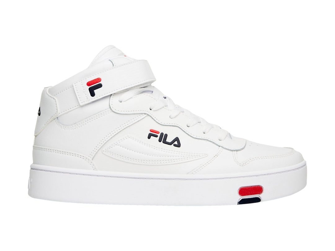 Tenis FILA MGX-100 Mid en color blanco con detalles en rojo y azul marino, con correa de velcro en el tobillo.