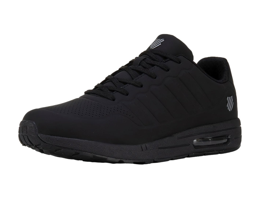 Tenis K-Swiss color negro monocromático con suela amortiguada y diseño deportivo.