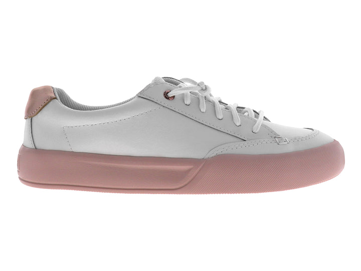 Tenis blancos de la marca Sperry con suela color rosa y cordones blancos.