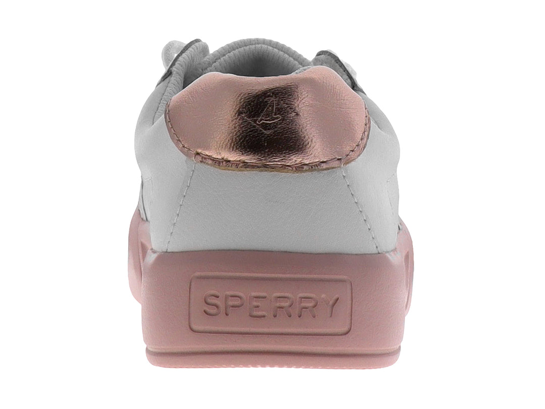 Tenis blancos de la marca Sperry con suela color rosa y cordones blancos.