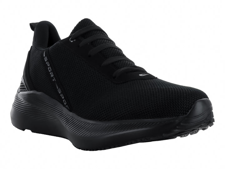 Tenis deportivo color negro con tejido de malla y suela gruesa.
