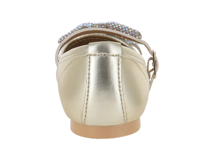 Zapato plano color oro metálico para niña con correa, hebilla y moño decorativo con brillos en la punta.