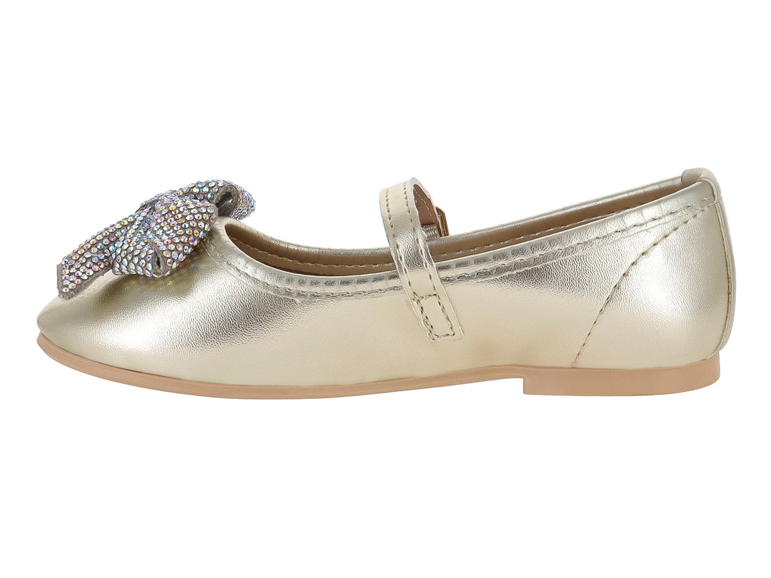 Zapato plano color oro metálico para niña con correa, hebilla y moño decorativo con brillos en la punta.