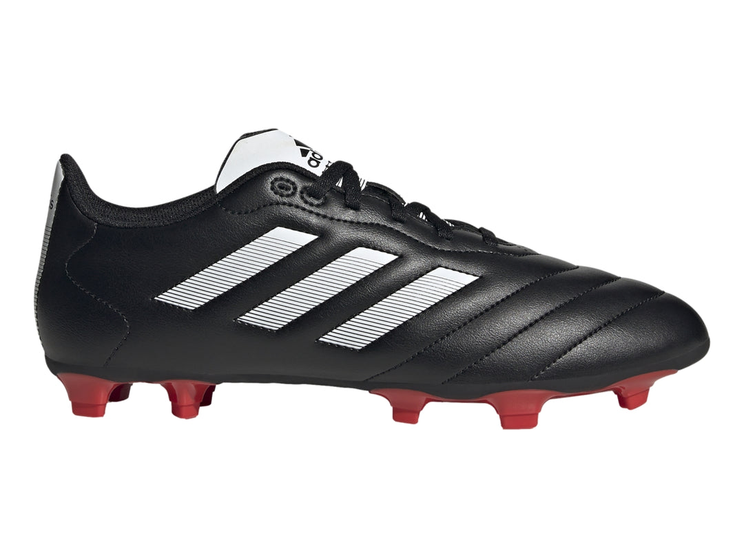 Botas de fútbol Adidas Goletto VIII en color negro con tres franjas blancas y tacos rojos.