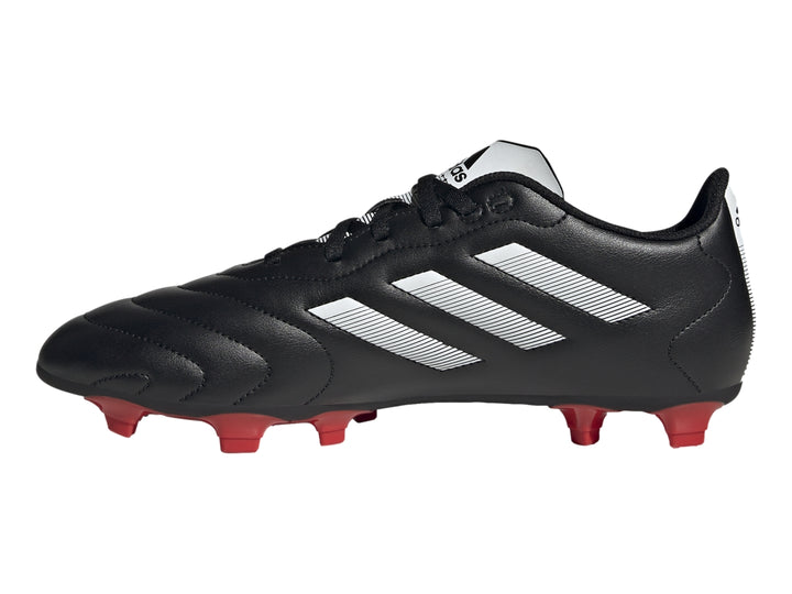 Botas de fútbol Adidas Goletto VIII en color negro con tres franjas blancas y tacos rojos.