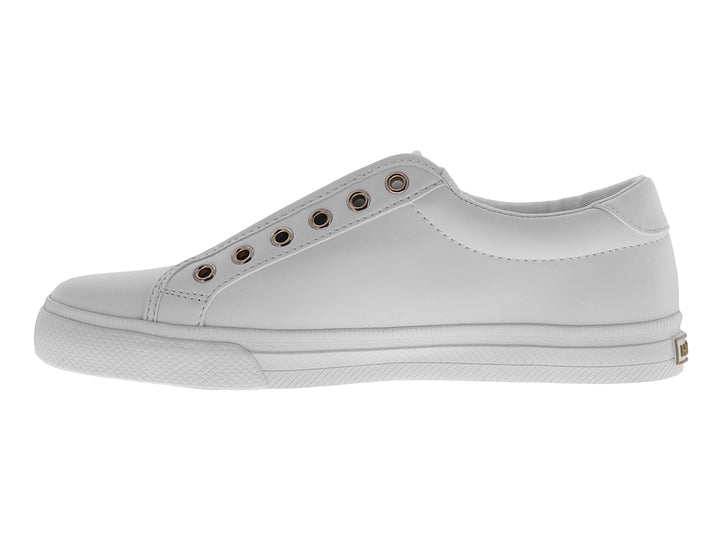 Tenis Tommy Hilfiger color blanco estilo slip-on con detalles de ojetes laterales y suela blanca.