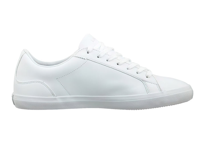 Tenis Lacoste Lerond de color blanco, confeccionados en cuero liso con suela blanca y agujetas a juego.