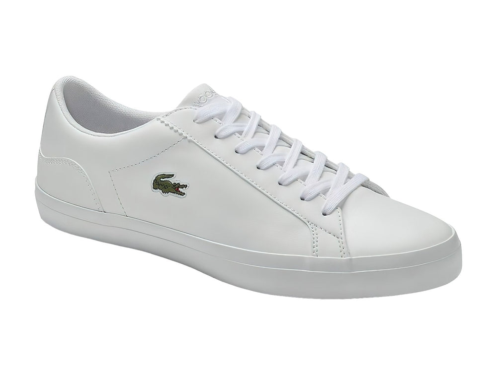 Tenis Lacoste Lerond de color blanco, confeccionados en cuero liso con suela blanca y agujetas a juego.