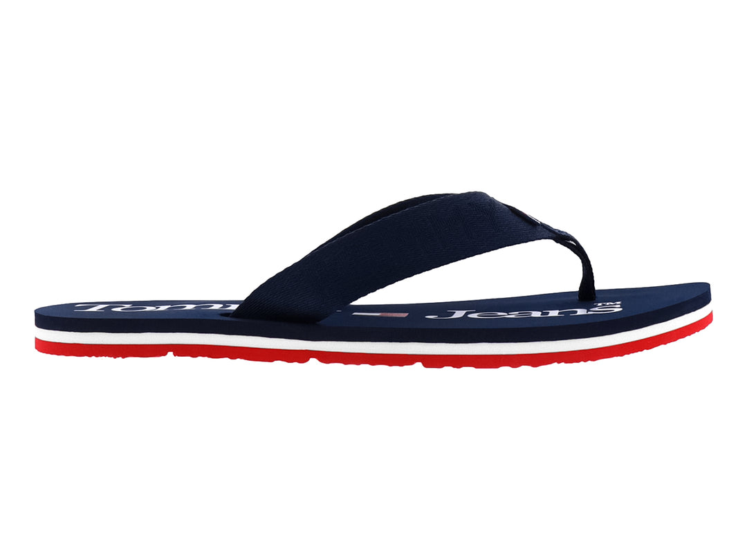 Sandalias Tommy Hilfiger color azul marino con suela en capas de color blanco y rojo.