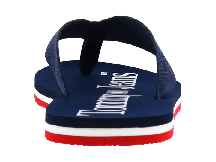 Sandalias Tommy Hilfiger color azul marino con suela en capas de color blanco y rojo.