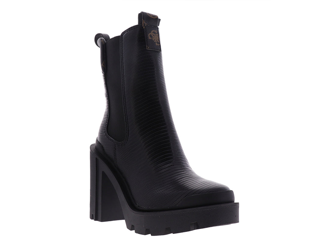 Botín negro Guess con tacón grueso y suela de plataforma dentada.