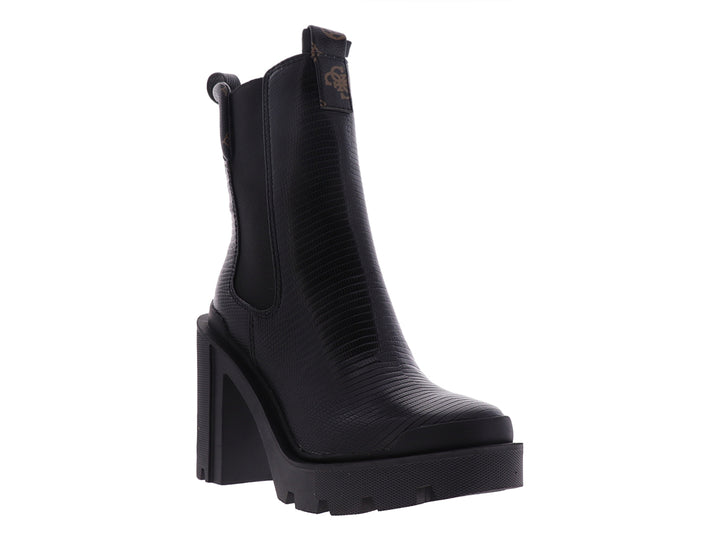 Botín negro Guess con tacón grueso y suela de plataforma dentada.