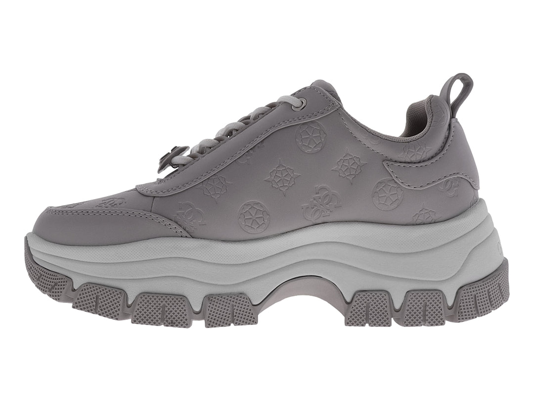 Tenis Guess GW Bria en color azul grisáceo con suela de plataforma gruesa y detalles grabados.